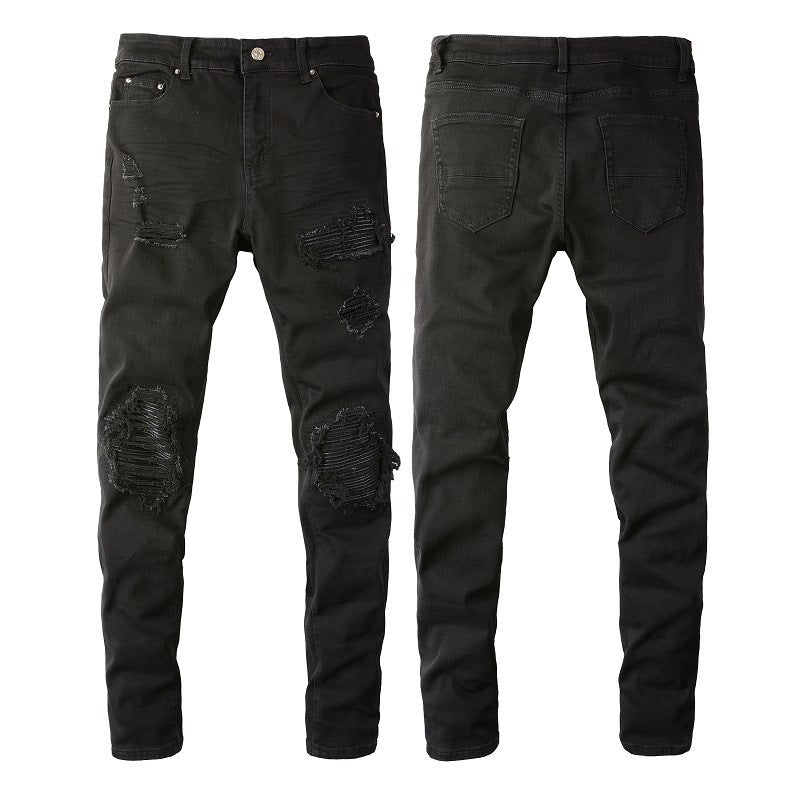 Jeans negros ajustados de hombre con rotos desgastados en las rodillas y paneles acanalados superpuestos para un estilo urbano y elegante (602-8520)
