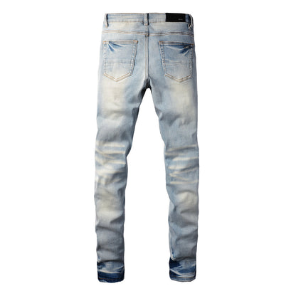 Men’s Light Blue Ripped Skinny Jeans with Black Fabric Patches, Distressed Detailing and Gradient Wash 848