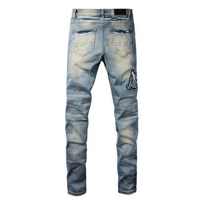 Men’s Light Blue Ripped Skinny Jeans with Embroidered Patch and Contrast Stripe Layering 8897